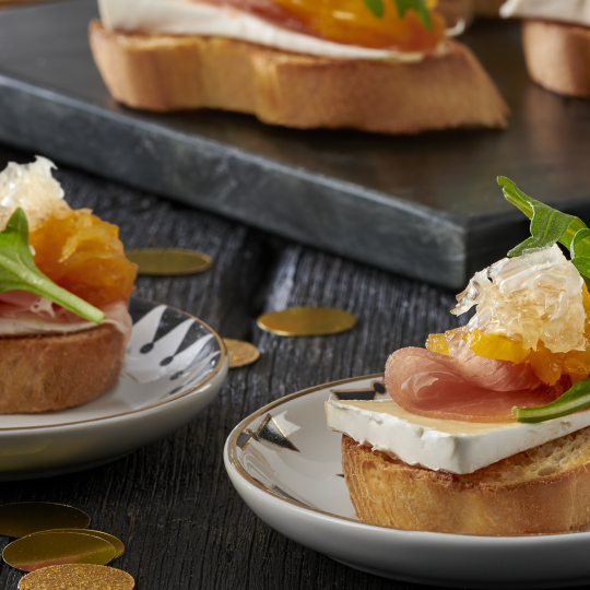 Prosciutto and Brie Crostini